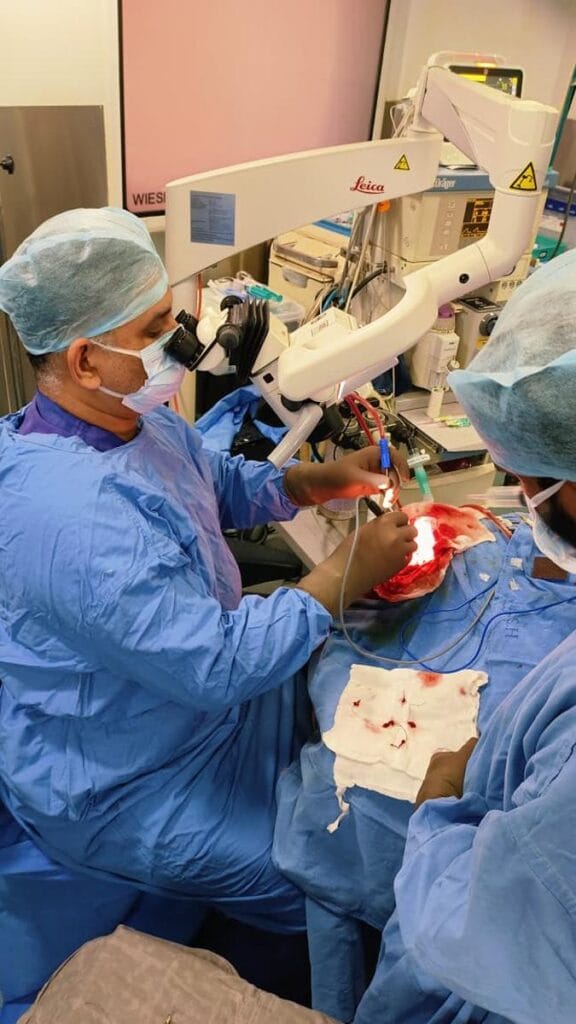 Dr. Nishant Kumar Shukla performing brain stroke surgery in operating theater